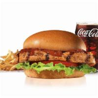 Charbroiled Bbq Chicken™ Sandwich Combo · Charbroiled chicken breast, lettuce, tomato and tangy BBQ Sauce on a potato bun. Served with...