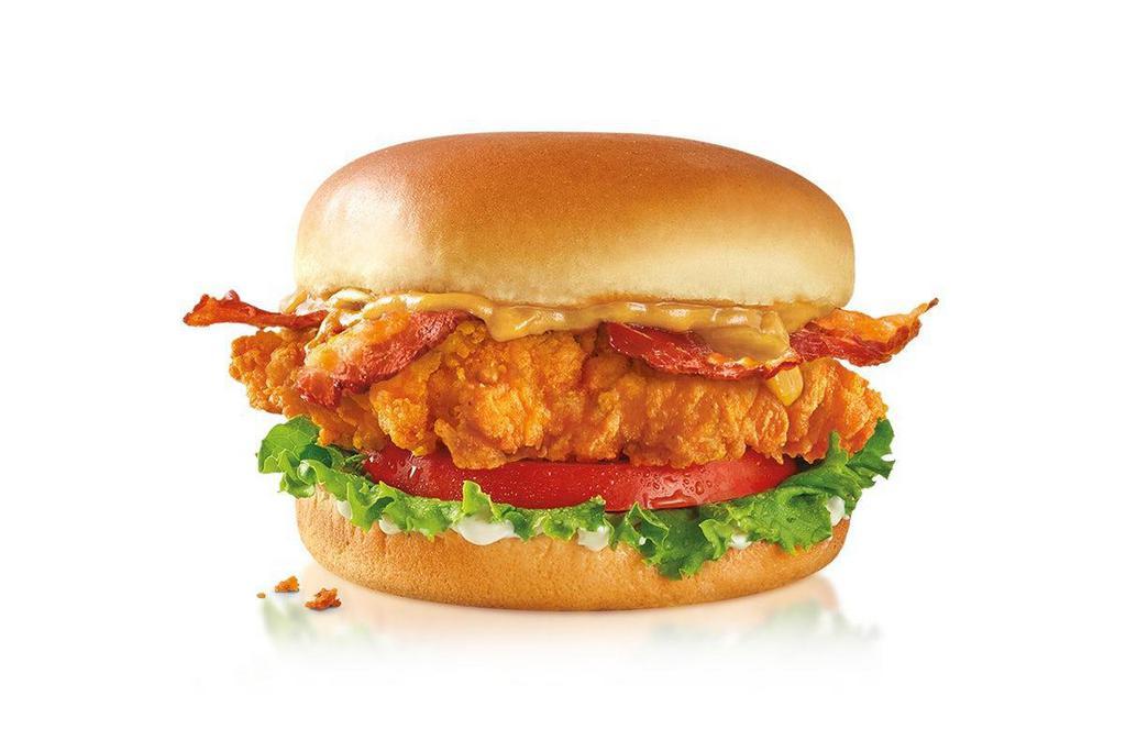 Gold Digger Hand Breaded Chicken Sandwich · A tender all-white meat chicken breast fillet, hand battered and breaded, topped with sweet Carolina Gold sauce, bacon, tomato, green leaf lettuce and mayo; served on a toasted potato bun..