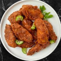 Hot Ville Wings  · Fresh chicken wings breaded, fried until golden brown, and tossed in Nashville Hot Sauce. Se...