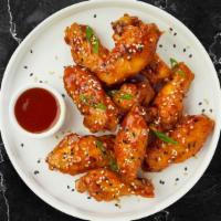 Wing Infusion  · Fresh chicken wings breaded, fried until golden brown, and tossed in sweet and sour sauce. S...