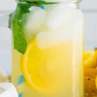 Lemonade · Freshly squeezed lemonade, served over ice.