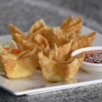Cream Cheese Wonton · The name day it all. Served with sweet and sour sauce.