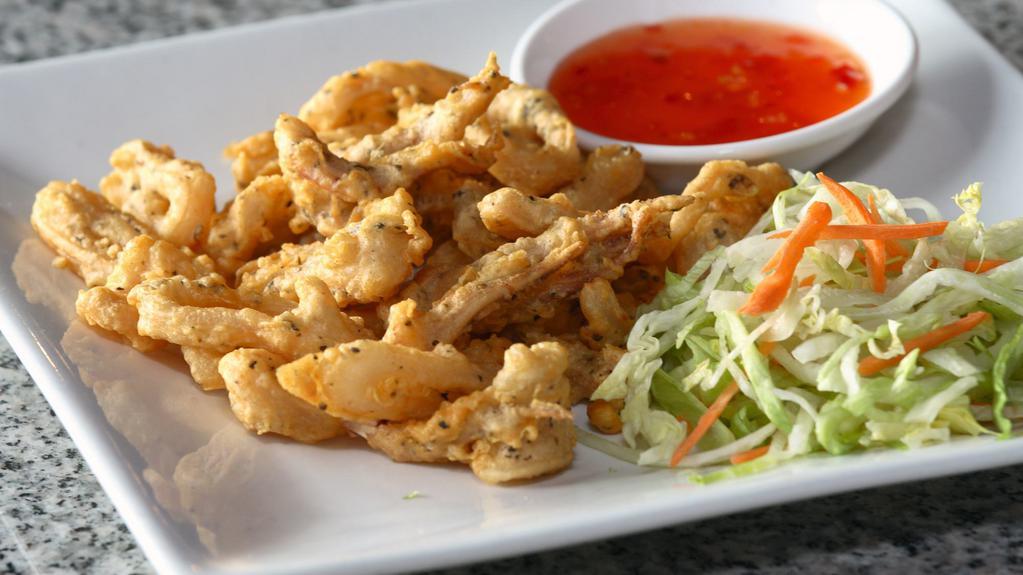 Calamari · Deep fried salt and pepper squid. Served with Thai sweet chili dipping sauce.