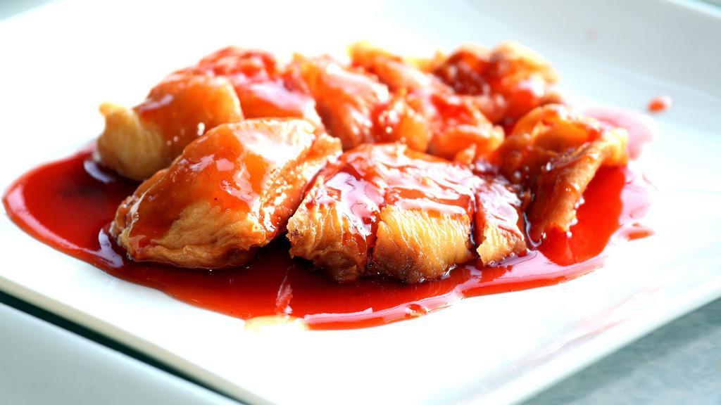 Sweet & Sour · Deep fried and battered in a sweet and sour citrus sauce. Served with Jasmine rice.