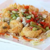 Baked Salted Shrimp · Fried to golden brown with bell peppers, onions, with a dash of salt and black pepper. Serve...