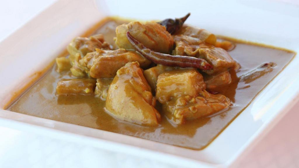 Yellow Curry Chicken · Consists of dark meat stir fried with yellow curry powder, potatoes with a slight touch of coconut milk. Served with Jasmine rice.