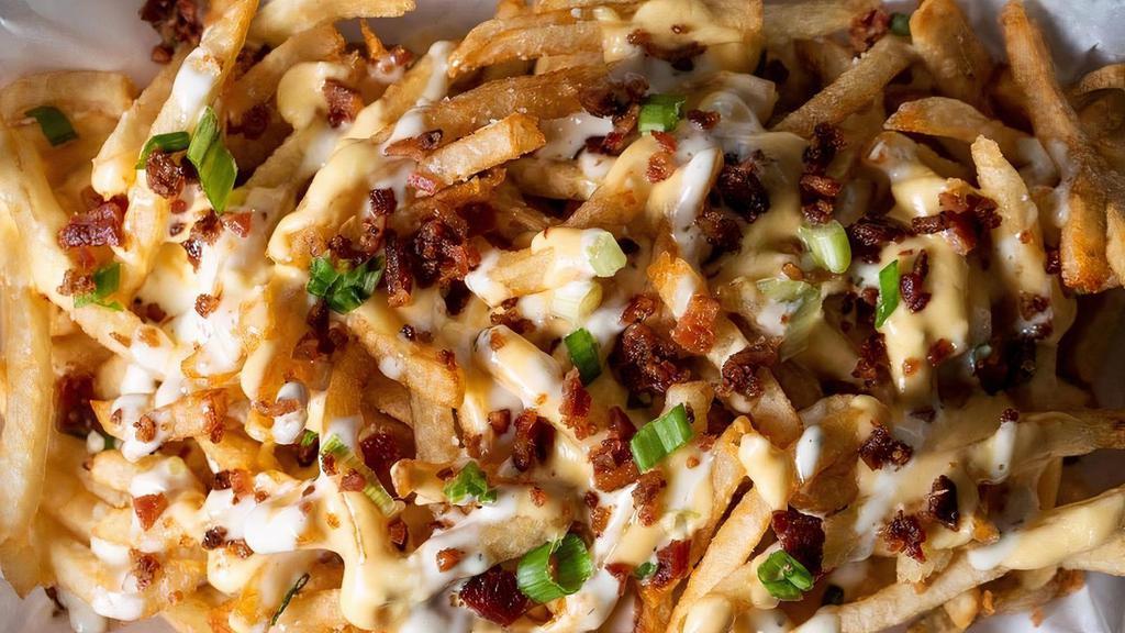Works Fries · Basket of Fries with Ranch, Cheese Sauce, Bacon and Scallions