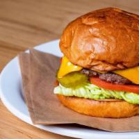 The Cheeseburger · 1/3lb Patty, American Cheese, Caramelized Onions, Burger Sauce, Lettuce, Tomato and Dill Pic...