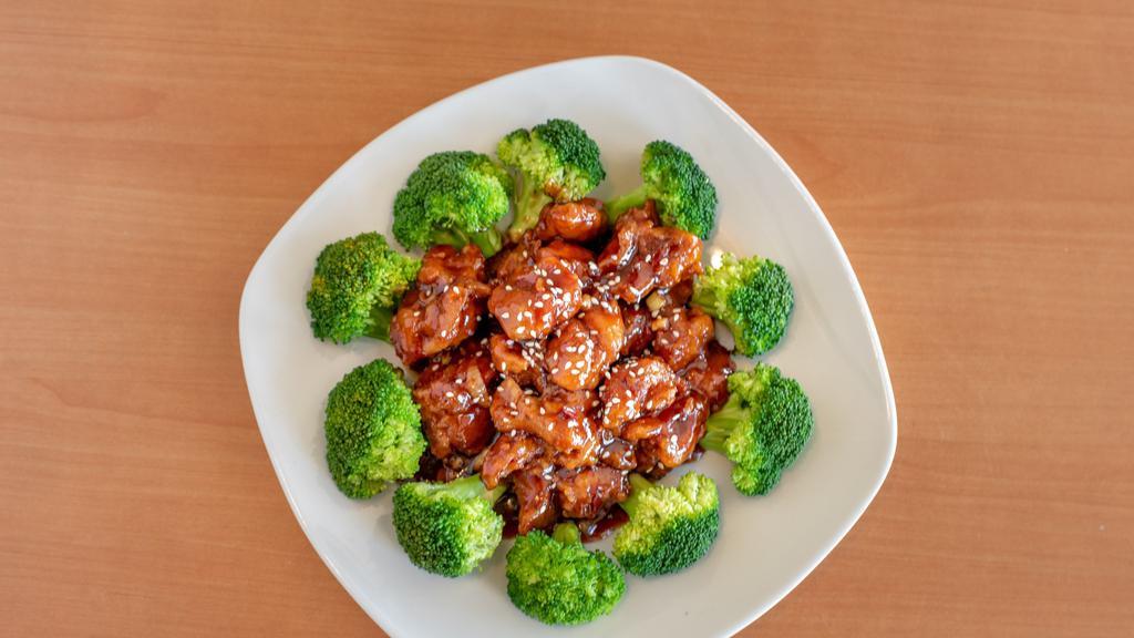 Sesame Chicken · Served with fried rice or white rice and egg roll.