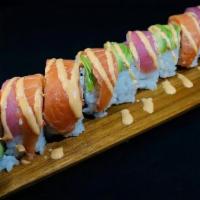 Rainbow Roll · Crab, masago, avocado, and cucumber. Topped with tuna, salmon, hamachi, and spicy mayo. Fres...