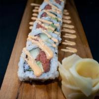Spicy Tuna Rolls · Spicy tuna, avocado, and cucumber. Topped with sesame seeds and spicy mayo. Freshly prepared...