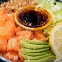 Salmon Poke Bowl · Assortment of sushi rice and vegetables. Topped with one serving of poke salmon and imitatio...