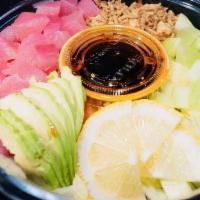 Tuna Poke Bowl · Assortment of sushi rice and vegetables. Topped with one serving of poke tuna and imitation ...