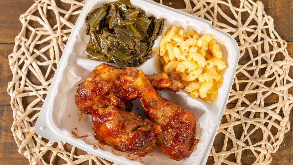 Bbq Chicken Dinner Plate · Two pieces of BBQ chicken with your choice of two side dishes.