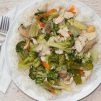 Chicken With Vegetables · Snow peas, baby corn, mushrooms, and Chinese cabbage sauteed in a delicate wine sauce.
