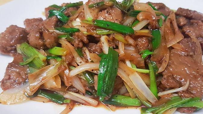 Mongolian Beef · Sliced beef marinated in a brown sauce, sauteed with scallions.