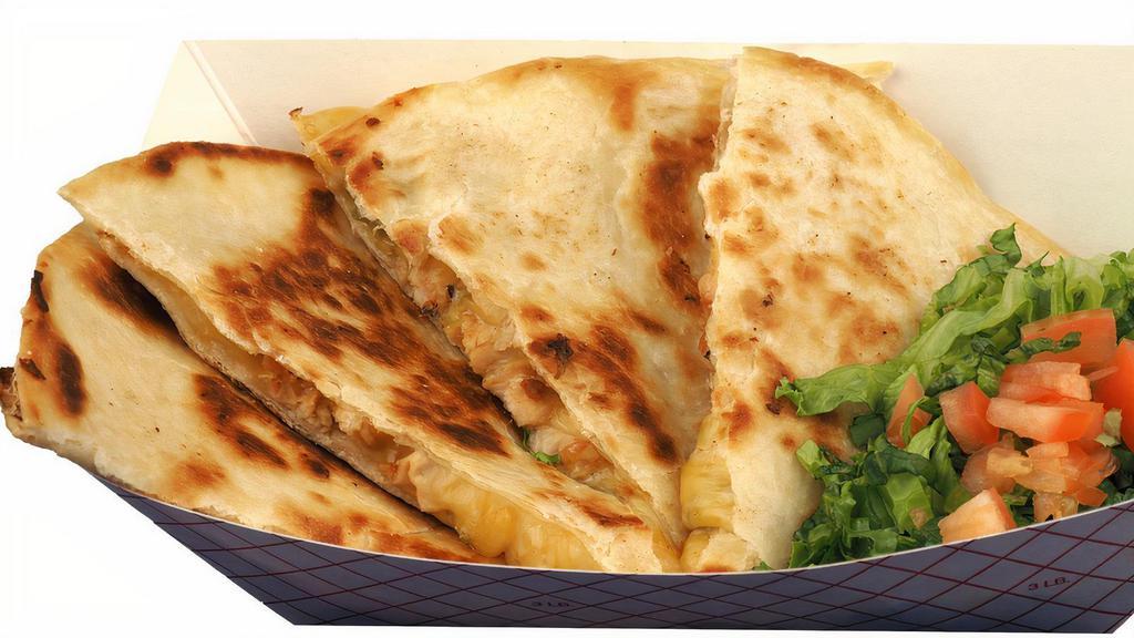 Green Chile Chicken Quesadilla Plate · Roasted Hatch green chile, grilled chicken breast, melted cheese in a buttery grilled flour tortilla