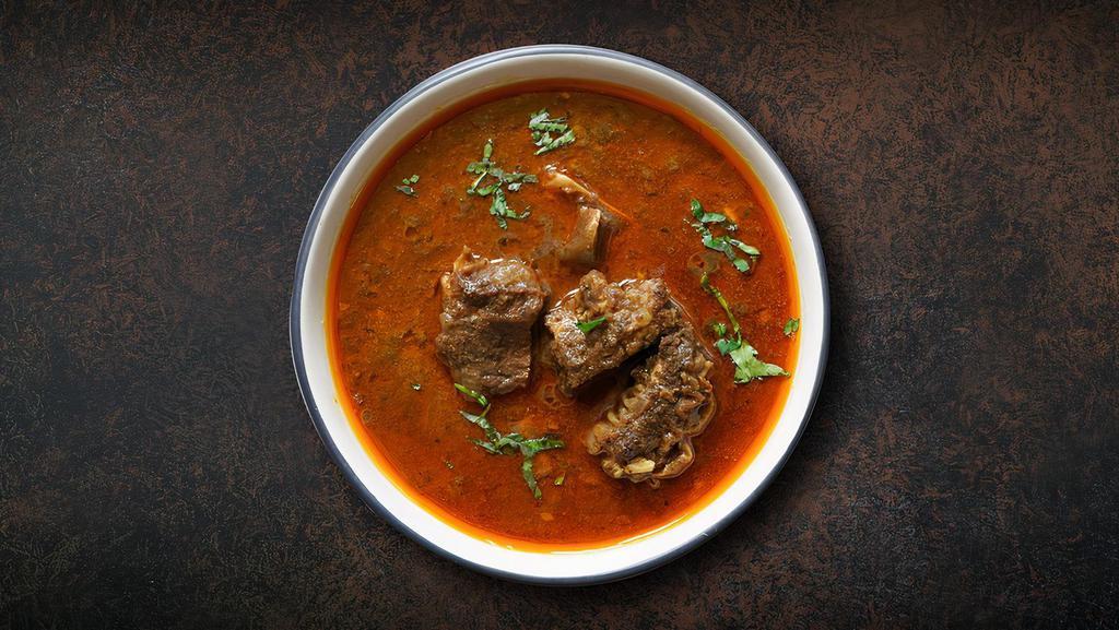 Lamb Wild Korma · Lamb pieces Cooked with tomato sauce, cream, and Indian spices. Served with side of rice.
