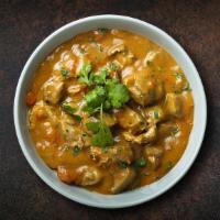 Wild Chicken Korma · Chicken pieces Cooked with tomato sauce, cream, and Indian spices. Served with side of rice.