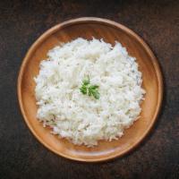 Steamed Rice  · Aromatic basmati rice boiled on a low flame.