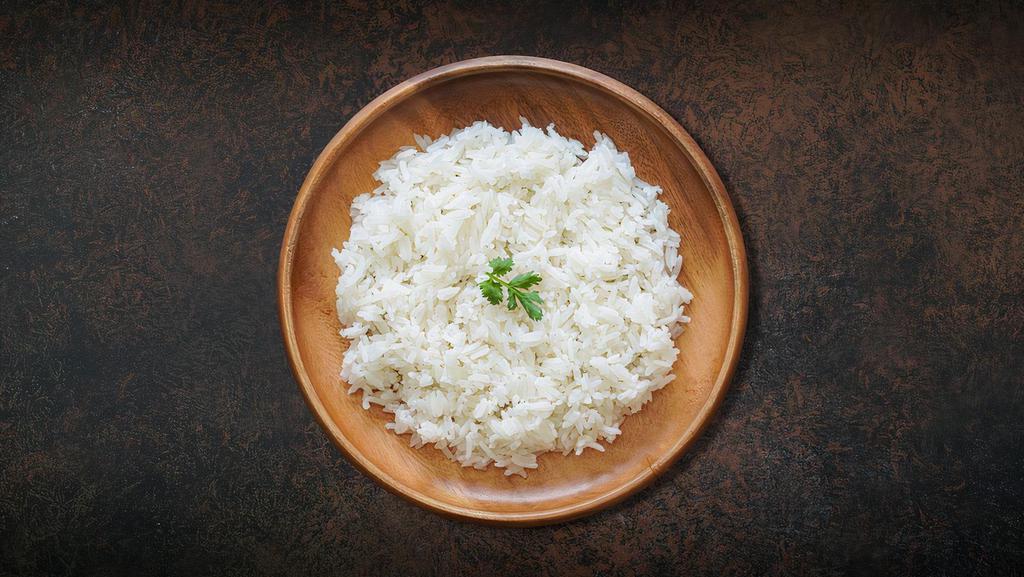 Steamed Rice  · Aromatic basmati rice boiled on a low flame.