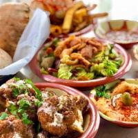 Mezze Medley · (Vegetarian) Your choice of five vegetarian Mezze items (smaller portions)