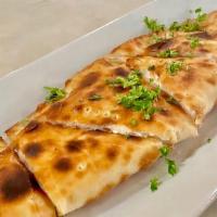 Cheese Fatayir · (Vegetarian) Mini pockets of dough filled with cheese & herbs, baked in tanoor oven