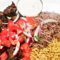 Beef Shish Kabob · (GF) Grilled grass-fed top sirloin Beef Kabob with tomatoes, onions, parsley, Tzatziki, your...