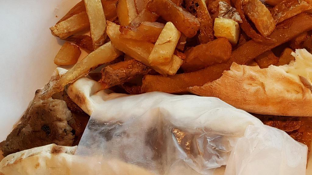 Kids Gyro Wrap · Gyro meat wrapped in kids-sized pita served with French Fries (no add-ons or substitutions)
