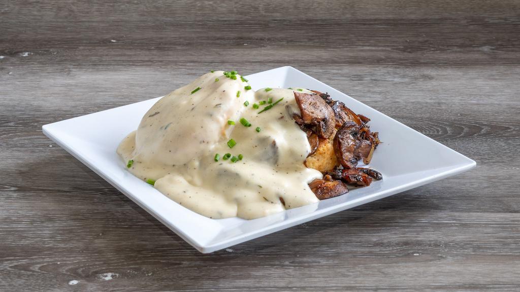 Biscuit With Mushrooms, Onions & Gravy · Balsalmic and red wine braised mushrooms on a biscuit topped with our vegetarian gravy.