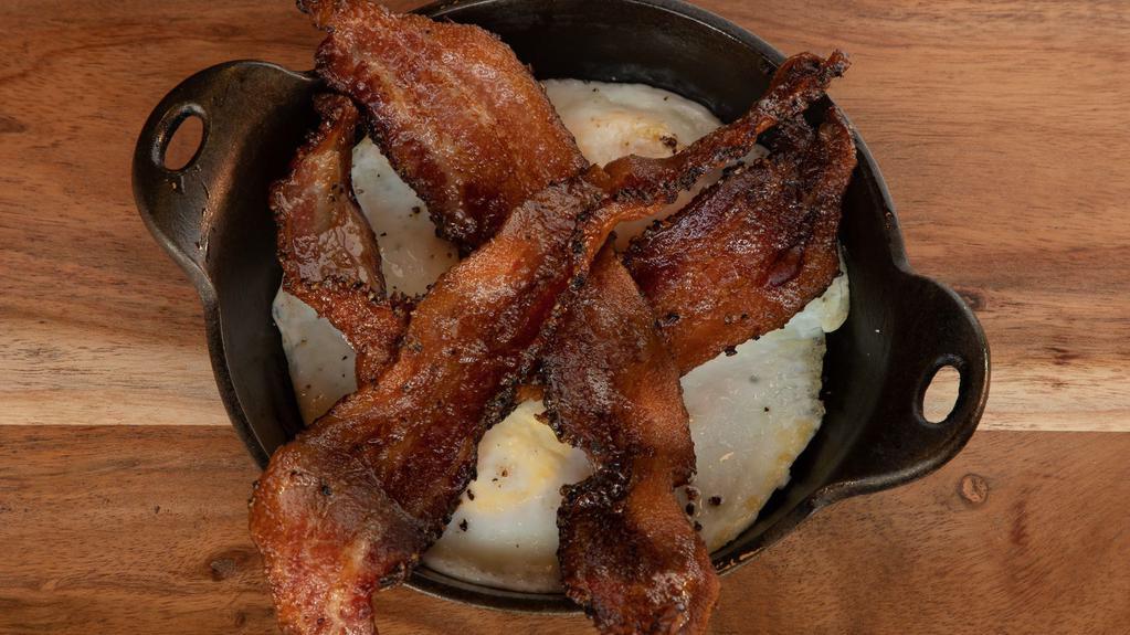 Two Eggs And Bacon · Two fried eggs with Think cut bacon