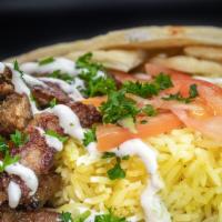 Mediterranean Plate · Choice of either lamb, chicken or falafel, served with Aybla rice, tomatoes, parsley, tzatzi...