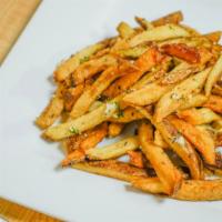 Hand Cut Fries · Hand-cut Fries served with garlic-grated Parmesan cheese.