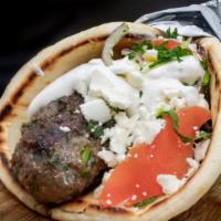 Super Kafta · Seasoned ground beef, made daily, grilled and served on Greek pita with baba ganouj, parsley...