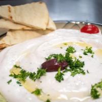 Tzatziki Plate · An authentic Greek sauce with yogurt, extra virgin olive oil, oregano, cucumber, fresh garli...
