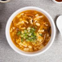 Two Roads To Soup · Bamboo shoots, soy sauce, chili garlic, mushrooms in a spicy and sour blend