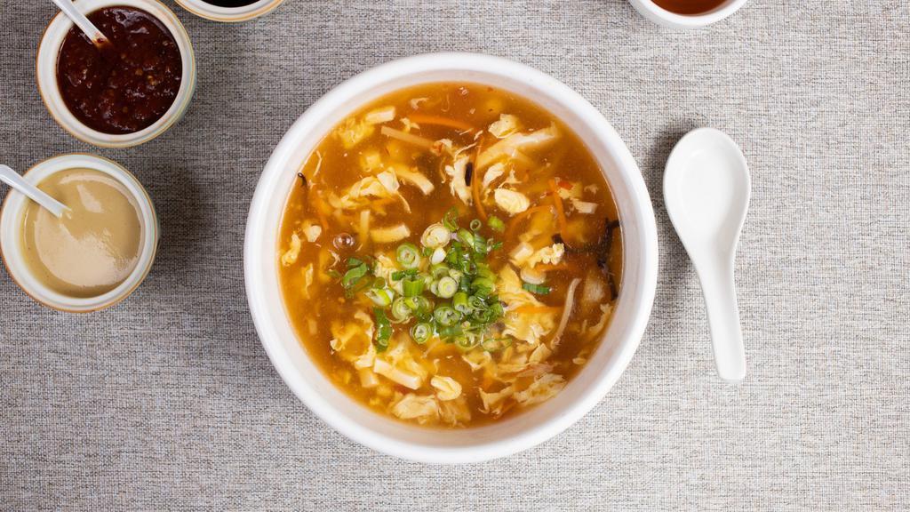 Two Roads To Soup · Bamboo shoots, soy sauce, chili garlic, mushrooms in a spicy and sour blend