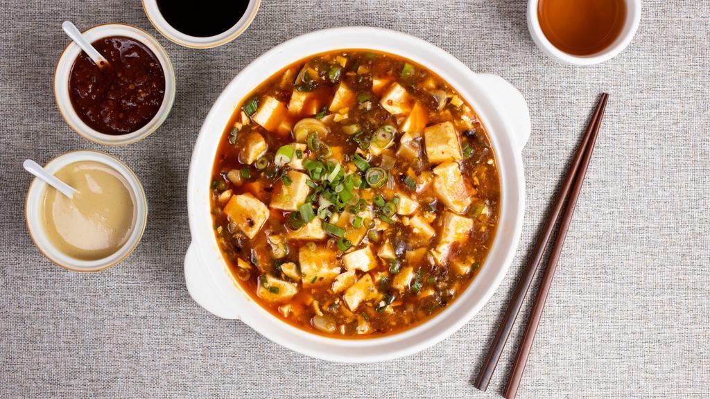 Enter The Dragon · Steamed soft diced tofu and chicken in a sauce with chili