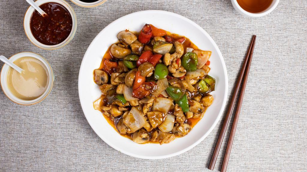 Mushroom Of Shadow Temple · Chicken stir-fried with mixed mushrooms, onions, and carrots.