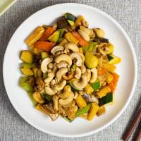The Way Of The Cashew · Chicken stir-fried with celery, broccoli, snow peas, white mushrooms, carrots, water chestnu...