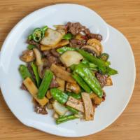 Mongolian Beef Army · Sliced beef stir-fried with white and green onions in a Mongolian sauce over a bed of crisp ...