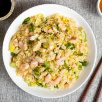 Rise Of The Shrimp  · Fresh shrimp pan-fried with steamed rice, egg, peas, and green onions
