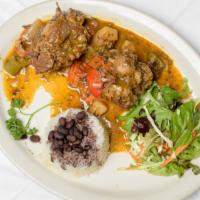 Rabo Encendido · Braised oxtail, served with white rice, black beans.