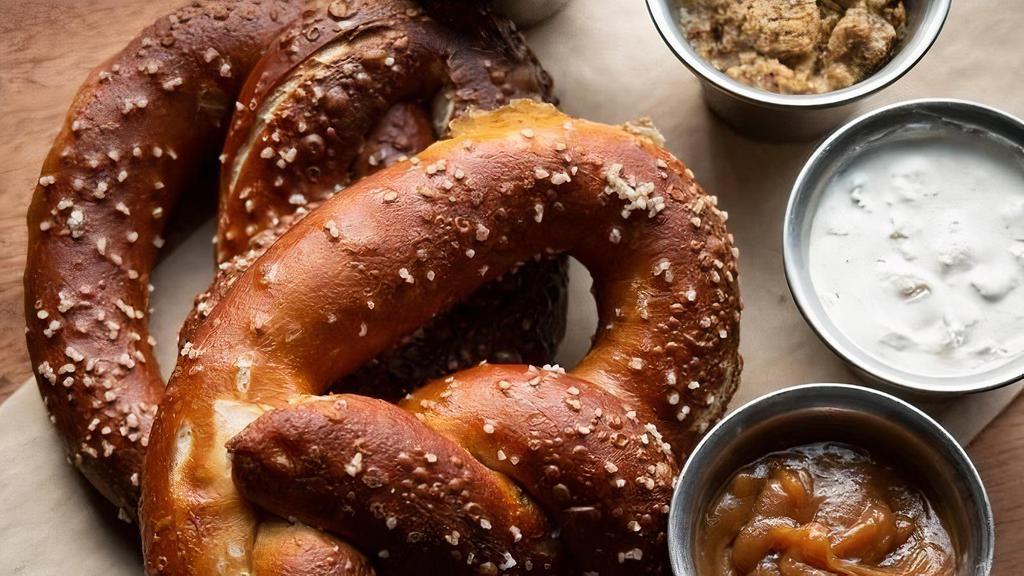 Hearth Baked Pretzel · Choose one sauce. Additional sauces for $1.5 each.. We charge 20% more for items on ALL third party delivery sites to cover the commission they charge us.  If you want to avoid this premium, we invite you to order for delivery or take-out .  at www.tavern-hall.com.