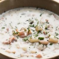 Bowl Of Clam Chowder · New England Style clam chowder, smoked bacon, red potatoes.  Bowl served with herb focaccia.