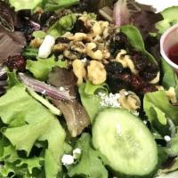 Fancy Cranberry Salad · Mixed greens, goat cheese, walnuts, onions, cucumbers & cranberries with our raspberry vinai...