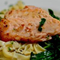 Salmon Fettuccine With Spinach · Fresh salmon filet, sautéed spinach & capers in creamy garlic sauce.
