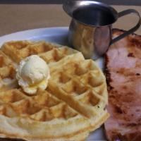 Pig & Waffle · Belgian Waffle served with a large cut of smoked pit ham.