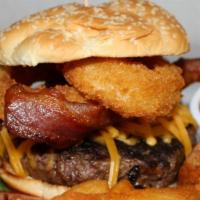 The Granger Burger · This burger is stacked with hardwood smoked bacon, mayo, onion rings and cheddar cheese. Ser...