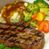 New York Steak · 1/2 pound certified Angus steak served with mashed and mixed vegetables.